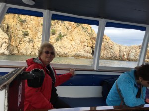 Glass bottom boat ride along the cliffs, caves, and hidden beaches